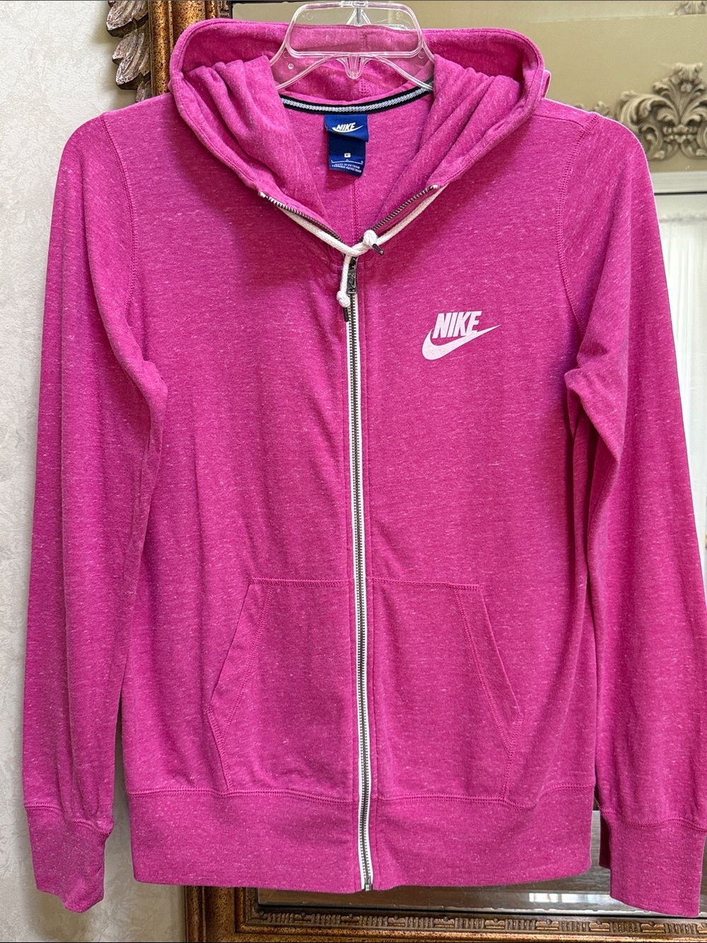 NWOT Nike Women’s light weight full zip hoodie.  Size L.  Pink.